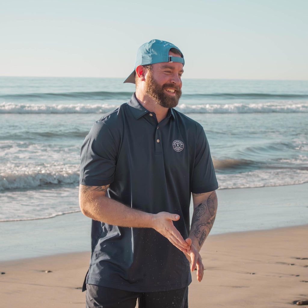 Anchored Spirits Embroidered Performance Jersey Polo